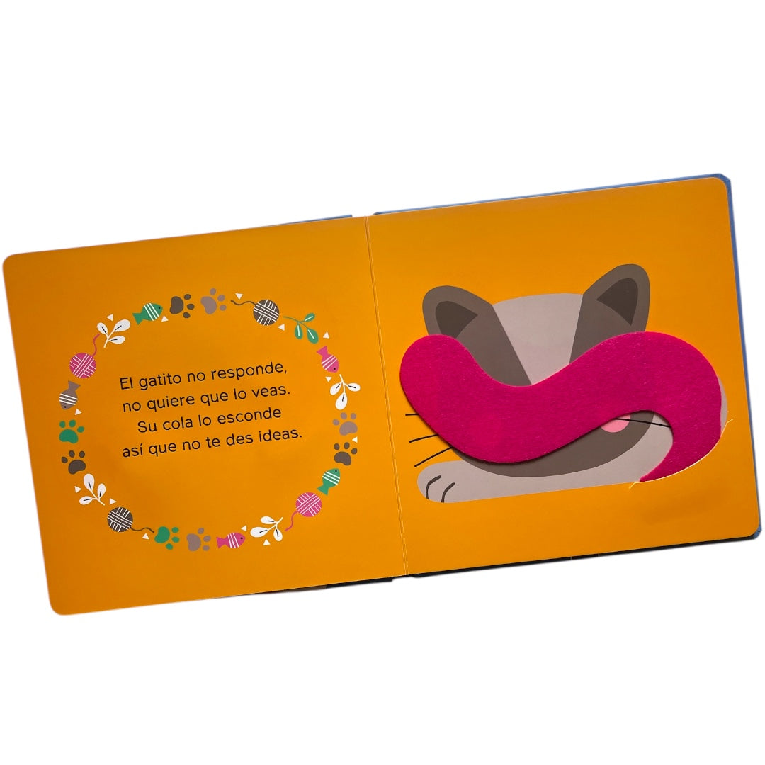 El perro juega a esconderse